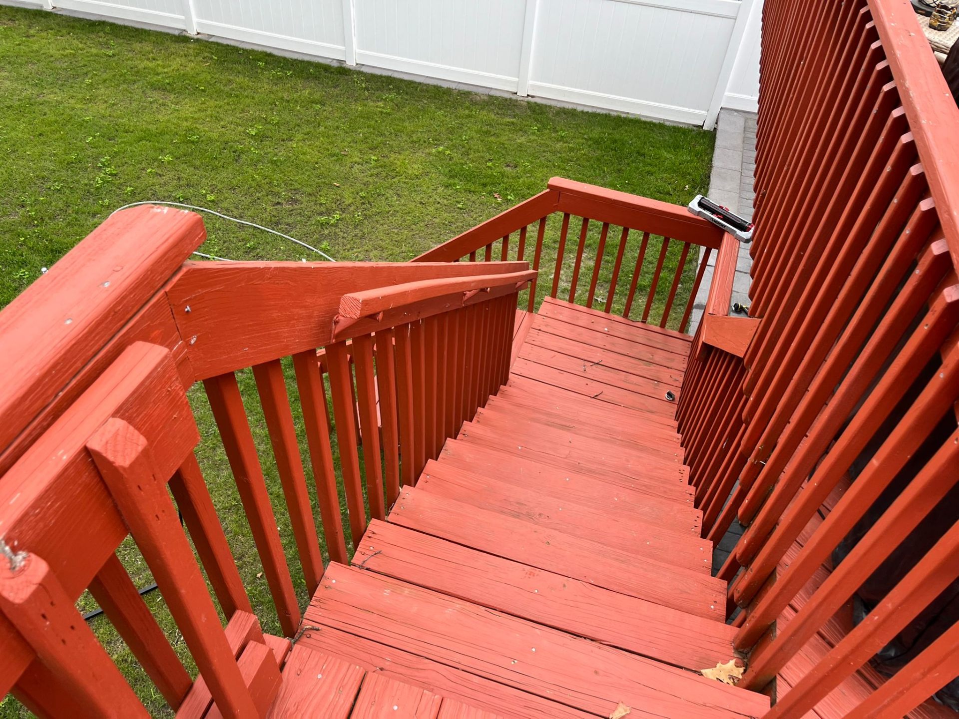 Painted wood deck stairs and railings